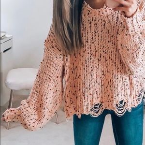 Adorable confetti distressed pink lily sweater